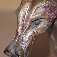 gold and red clay dragon sculpture